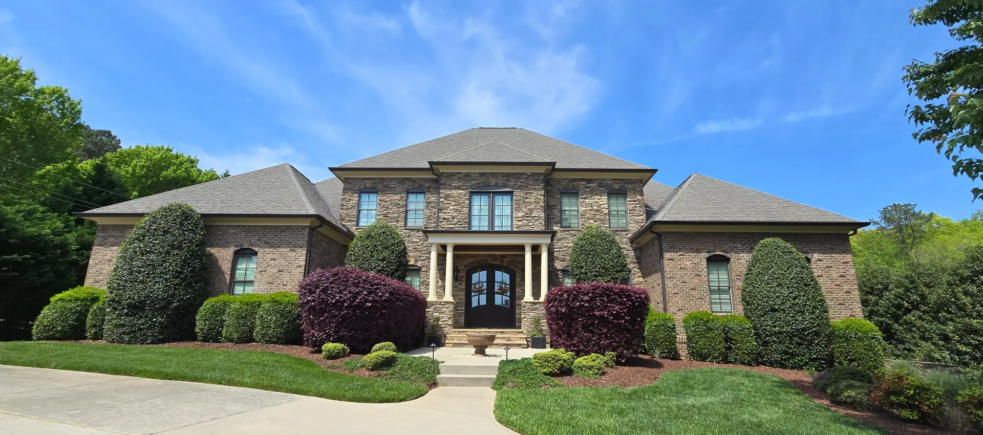 Professionally painted house exterior in Raleigh, North Carolina.