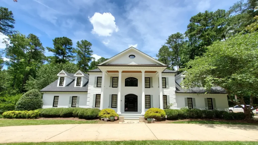 An outdoor image after completing a full exterior makeover by A Touch of Color's team of professionals, who substantially improved a home’s curb appeal.