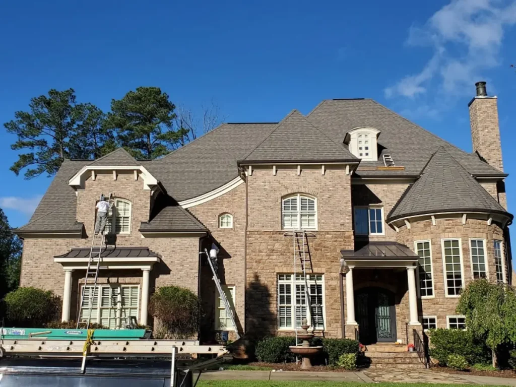 Our painters preparing and painting the outside of a home.