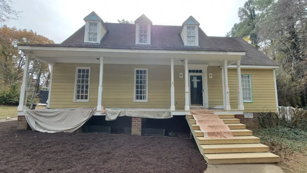 New wood front porch floor covering and protection before painting.