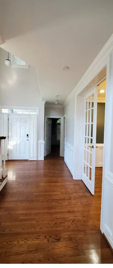 The entry of a home in Raleigh of a happy customer after completion.