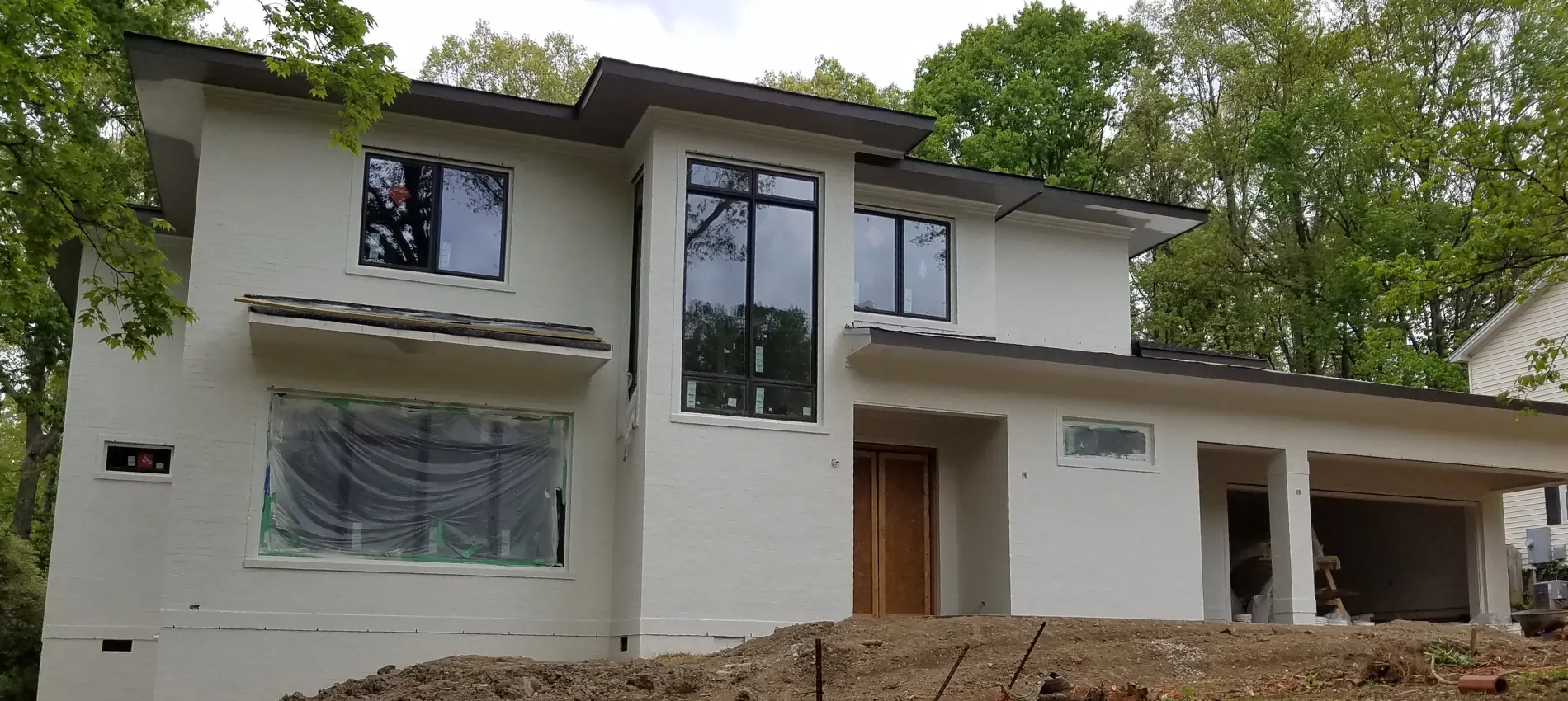 Professional commercial exterior painting in Raleigh, NC by A Touch of Color Painting & General Contracting.
