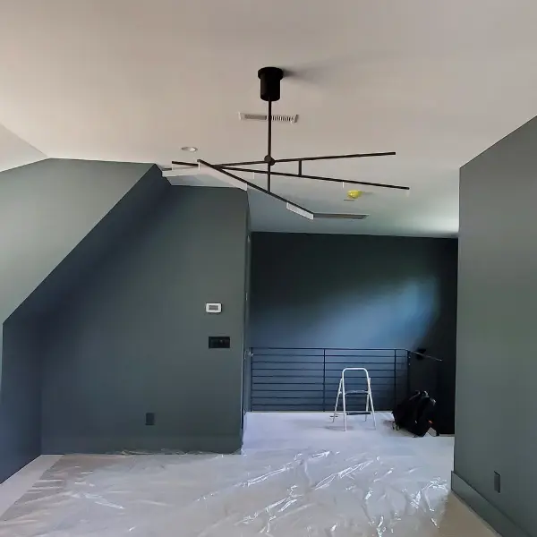 A finished ceiling in a bonus room after removing a textured popcorn ceiling.