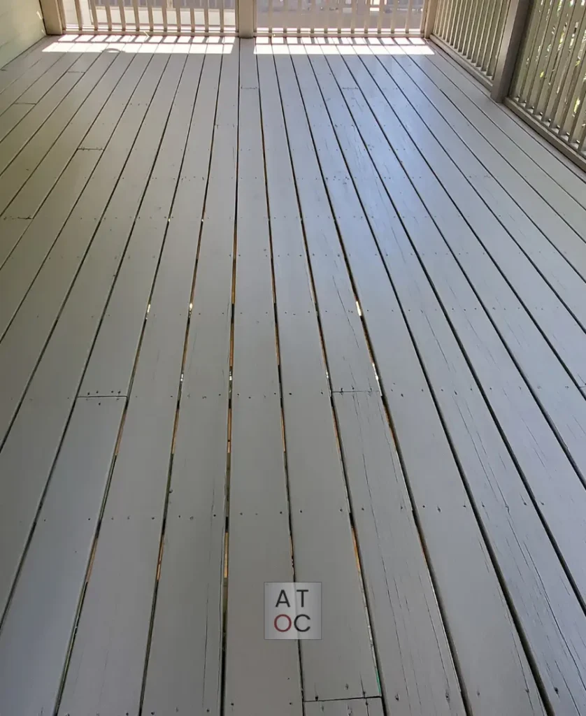 Expert staining restoration in the Triangle area featuring a professionally stained and weather-sealed wood finish by A Touch of Color Painting & General Contracting.