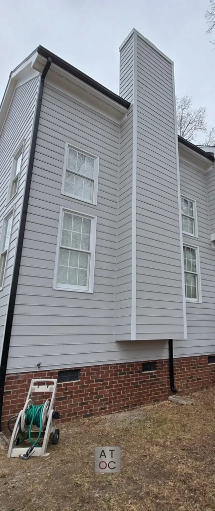 Professional chimney siding repair and structural restoration in Raleigh, NC, by Licensed General Contractor #83453.