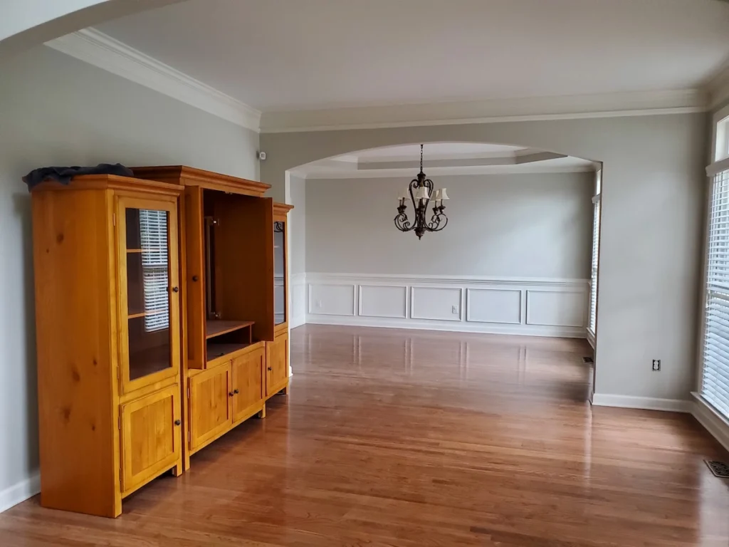 A dinning room updated to look more modern with light French Gray walls and all textured ceiling scraped, sanding, and painted in a flat white finish.
