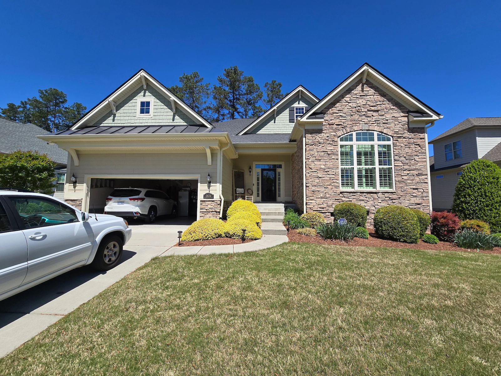 Full siding, trim, and soffit replacement using Color Plus Siding by James Hardie.