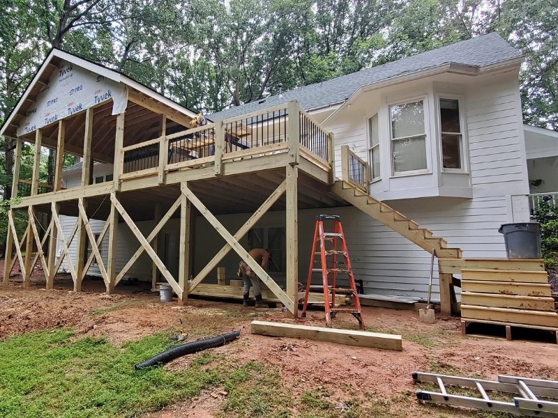 Rear of a house in Raleigh that shows A Touch of Color building an additional exterior structure.