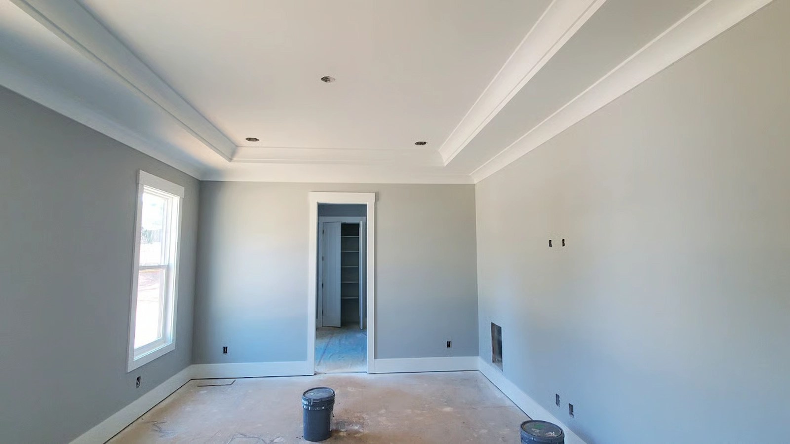 Perfectly floated and seamed drywall in a renovated bedroom in Raleigh.