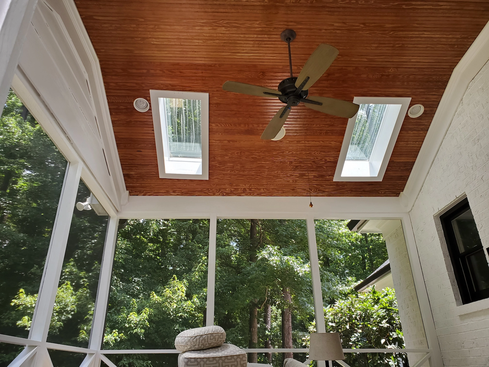 Image of a stained natural wood ceiling. Image of a stained natural wood ceiling.